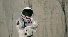 Astronaut Holding Something