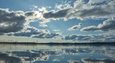 Blue sky and Clouds over Body of Water