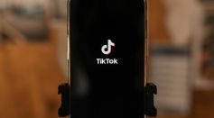 A business phone displays TikTok as it undergoes account recovery 