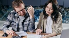Couple Looking at their Bills