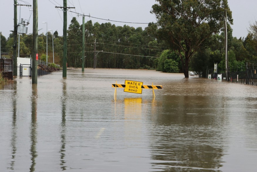 Flooded Street with a Sign