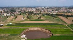 Giant Sinkhole Threatens A House And Sown Fields in Puebla