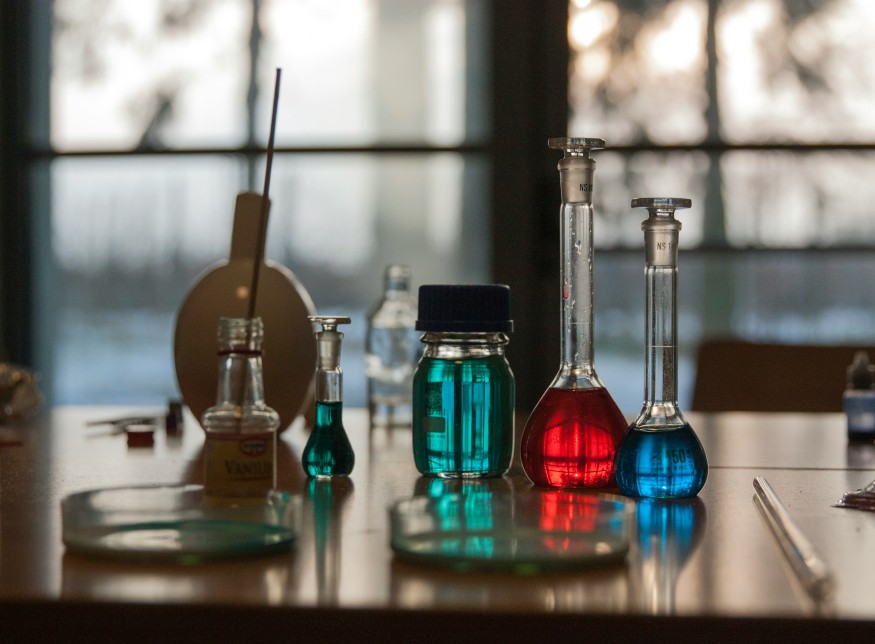 Glass Vials and Flask Filled with Liquid
