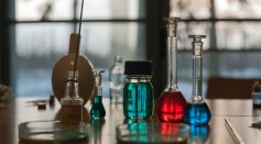 Glass Vials and Flask Filled with Liquid
