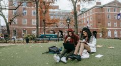 Man and Woman Studying at a Park