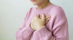 Person With Hands on Chest