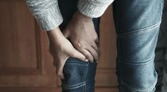 Person Holding the Knee