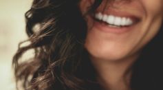 Person Smiling and Laughing