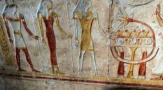 The relief carved walls of the tomb of T