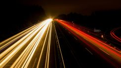 Speeding Car on High Way during Night Time