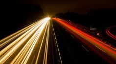 Speeding Car on High Way during Night Time