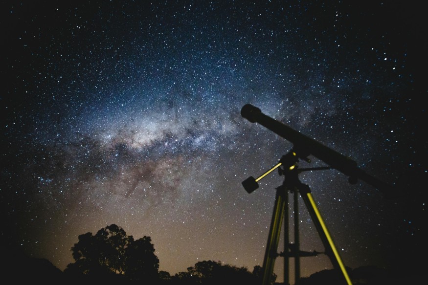 Telescope Under Blue and Black sky