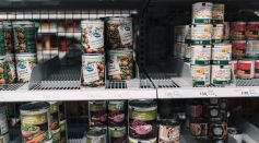 white and red labeled cans