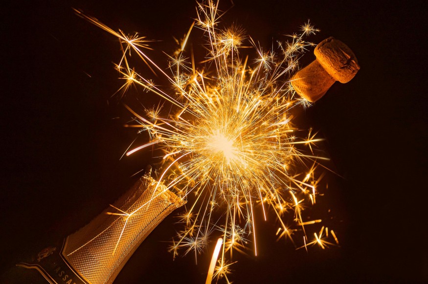 Why Do We Pop Champagne Bottles to Ring in the 